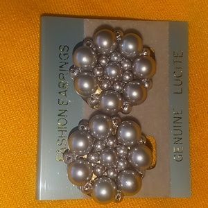 Lucite fashion earrings.